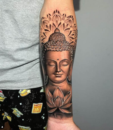 Tatuaje de buda en el brazo